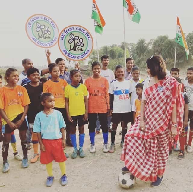 Mahua Moitra plays football in a saree with sports shoes & sunglasses