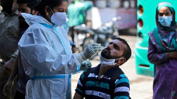 India reports highest single-day spike of over 1.15 lakh new COVID-19 cases; tally reaches 1,28,01,785