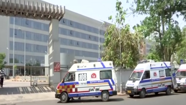 Ambulances line up with COVID patients in Gujarat's Ahmedabad; govt says can't link queues with hospital efficiency Ambulances line up with COVID patients in Gujarat's Ahmedabad; govt says can't link queues with hospital efficiency