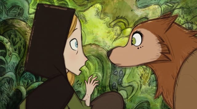 Robyn Goodfellowe, voiced by Honor Kneafsey, left, and Mebh Óg Mactíre, voiced by Eva Whittaker, in Wolfwalkers. (Apple via AP)