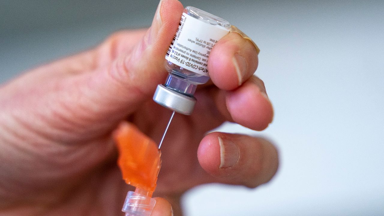 a syringe is loaded with the Pfizer-BioNTech COVID-19 vaccine at a clinic in Richmond, British Columbia, Canada. On Wednesday, May 5, 2021, Canada’s health regulator authorized the Pfizer vaccine for ages 12 and older. (Jonathan Hayward/The Canadian Press via AP)