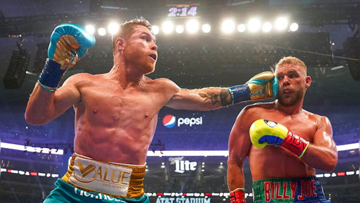 Canelo Alvarez beats Billy Joe Saunders to unify titles in front of record crowd