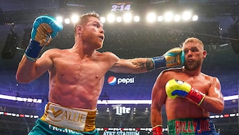 Canelo Alvarez beats Billy Joe Saunders to unify titles in front of record crowd