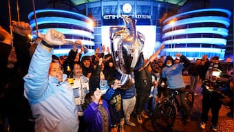 Premier League: Manchester City fans gather outside Etihad Stadium to celebrate title glory