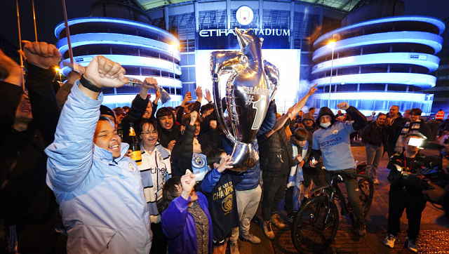 Premier League: Manchester City fans gather outside Etihad Stadium to celebrate title glory Premier League: Manchester City fans gather outside Etihad Stadium to celebrate title glory