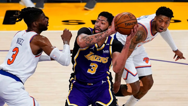 NBA: Lakers keep Knicks waiting for playoff berth after thrilling win; Pacers frustrate Sixers