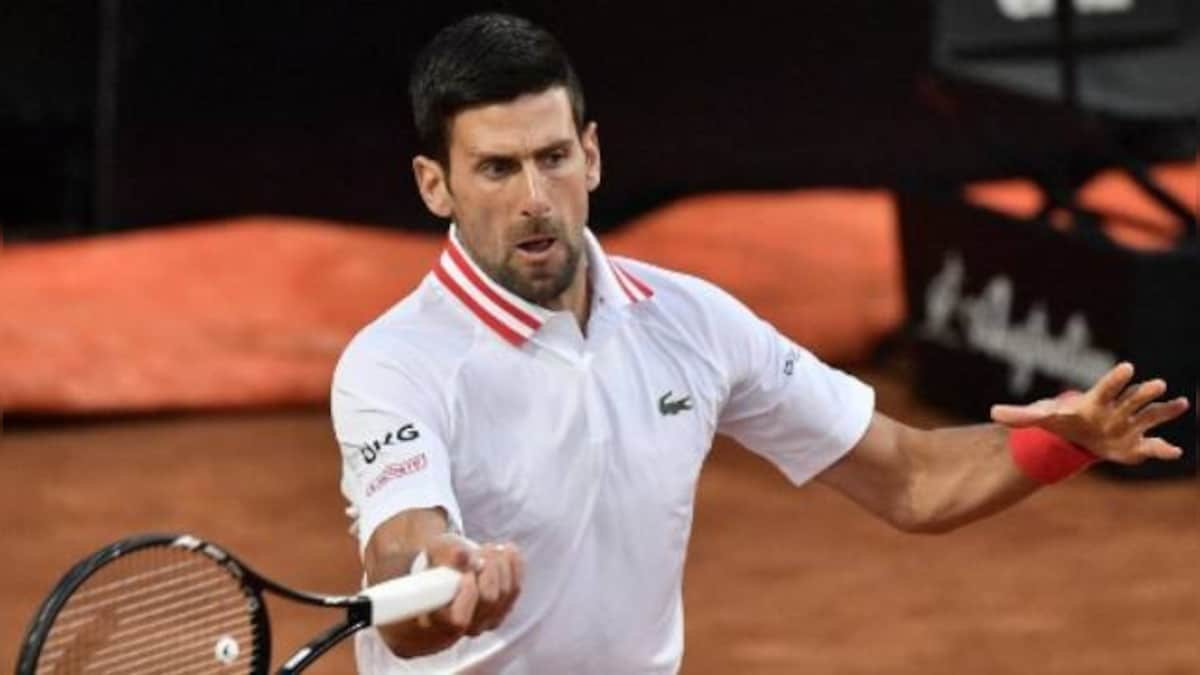 Italian Open: Novak Djokovic overcomes 'strange' three-hour rain delay to reach third round after beating Taylor Fritz