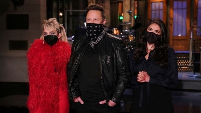 This image released by NBC shows musical guest Miley Cyrus, from left, host Elon Musk, and Cecily Strong during promos. AP photo