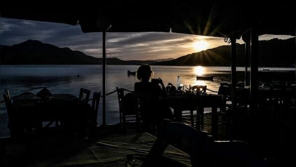 Greek islanders hope for better tourism season with an uptick in vaccination and eased restrictions