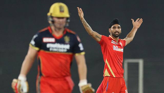 In a span of seven deliveries, Harpreet Brar took three important wickets of Kohli, Glenn Maxwell and AB de Villiers to turn his side's fortunes. Sportzpics 