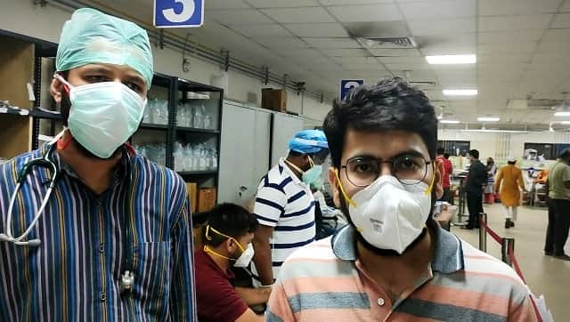 Dr Hasan Shamsi (right) and Dr Aquib Farooqui (left) narrate their experiences and ordeals while handling patients inside the emergency triage) 
