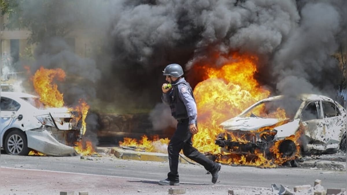 Palestinian president, Israeli defence minister hold rare talks amid violent clashes along Gaza border