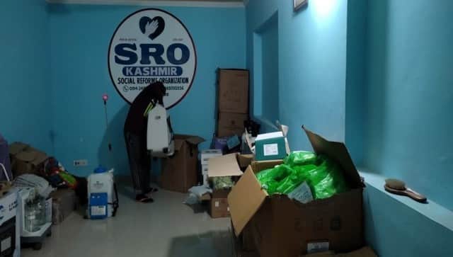 Shahid, a volunteer, showing the stock at the SRO office. Image courtesy: Quratulain Rehbar