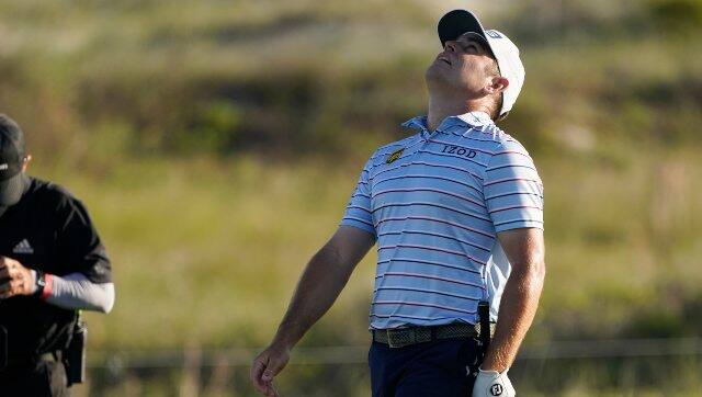 Louis Oosthuizen, of South Africa, reacts to a poor shot on the 18th hole during the second round of the PGA Championship golf tournament. AP