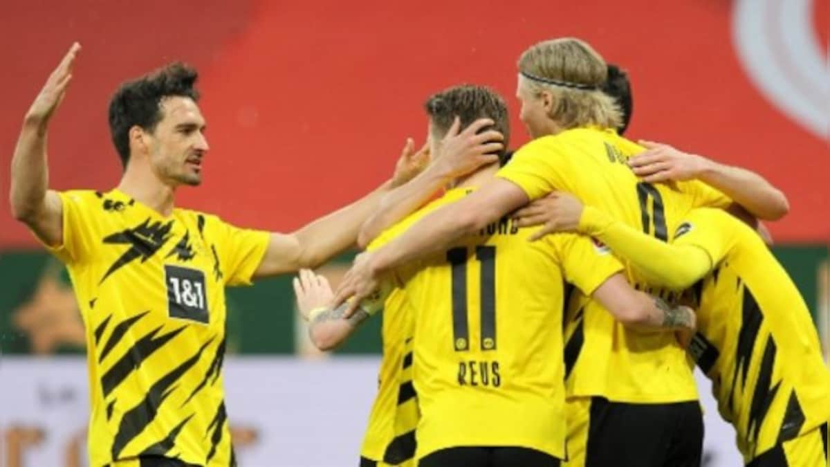 Bundesliga: Raphael Guerreiro, Marco Reus help Borussia Dortmund seal Champions League spot with win over Mainz