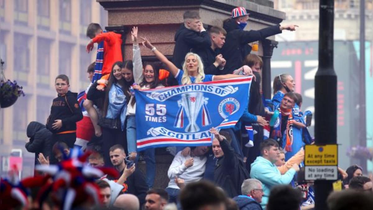 Police officers injured, 20 arrests made as Rangers fans' title celebration turns violent