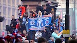 Police officers injured, 20 arrests made as Rangers fans' title celebration turns violent