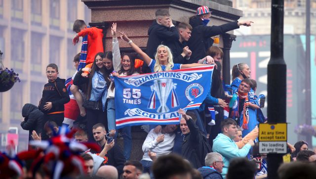 Police officers injured, 20 arrests made as Rangers fans' title celebration turns violent Police officers injured, 20 arrests made as Rangers fans' title celebration turns violent