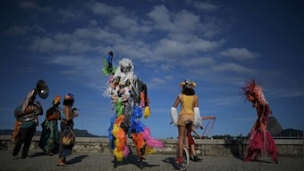 How a Brazilian carnival artiste coped with unemployment in the pandemic by reinventing her craft of stilt-walking