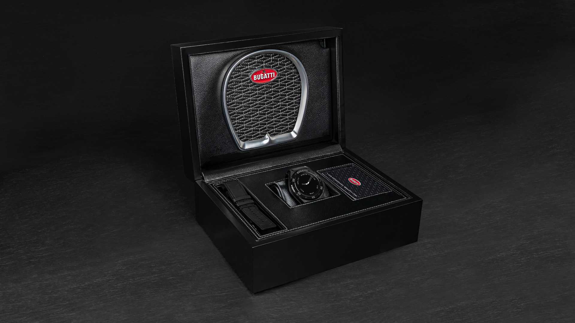 The smartwatch's box is made of sustainable wood and vegan leather, and sports a Bugatti horseshoe grille. Image: Bugatti