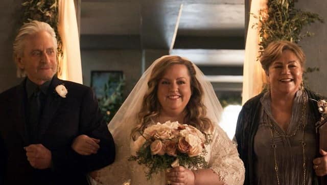 This image released by Netflix shows Michael Douglas, from left, Sarah Baker and Kathleen Turner in a scene from the third and final season of The Kominsky Method (Erik Voake/Netflix via AP)