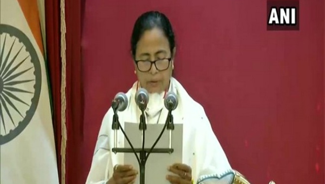Mamata Banerjee takes oath as West Bengal CM, says will tackle post-poll violence with 'firmness' Mamata Banerjee takes oath as West Bengal CM, says will tackle post-poll violence with 'firmness'