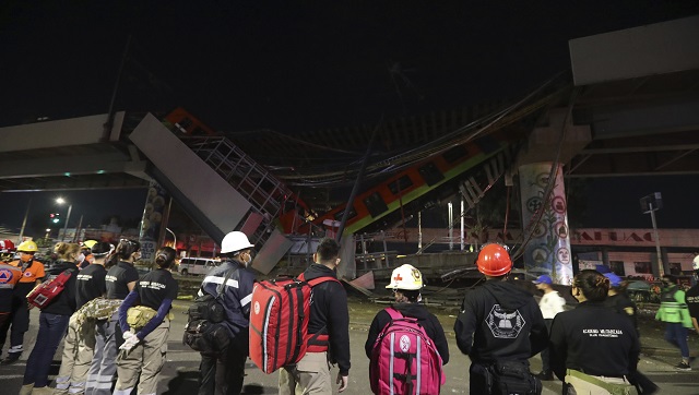 At least 20 dead, 70 injured as Mexico City metro overpass collapses onto busy road At least 20 dead, 70 injured as Mexico City metro overpass collapses onto busy road