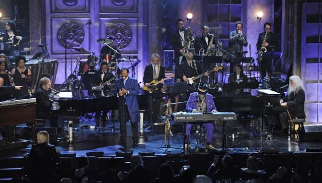 In this 15 March, 2011 file photo, from left, Elton John, Lloyd Price, Dr. John, and Leon Russell perform at the Rock and Roll Hall of Fame induction ceremony in New York ( AP Photo/Evan Agostini, File)