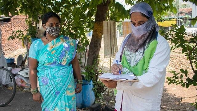 Shobha Patil, an Anganwadi sevika from Tardal village, completing the survey records