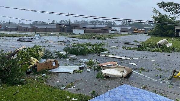 Ten including nine children killed in multi-vehicle crash as tropical storm Claudette lashes Alabama