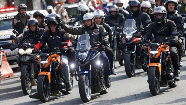 Brazil president Jair Bolsonaro fined $110 for flouting mask order at motorcycle rally in Sao Paulo