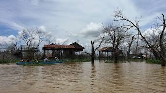Cambodians struggle to stay afloat, retain their identity after losing their homes to country's biggest dam
