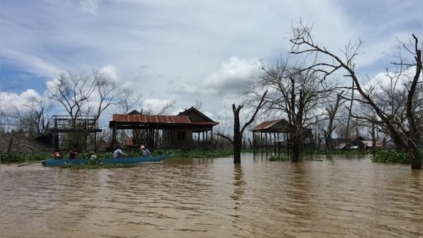 Cambodians struggle to stay afloat, retain their identity after losing their homes to country's biggest dam