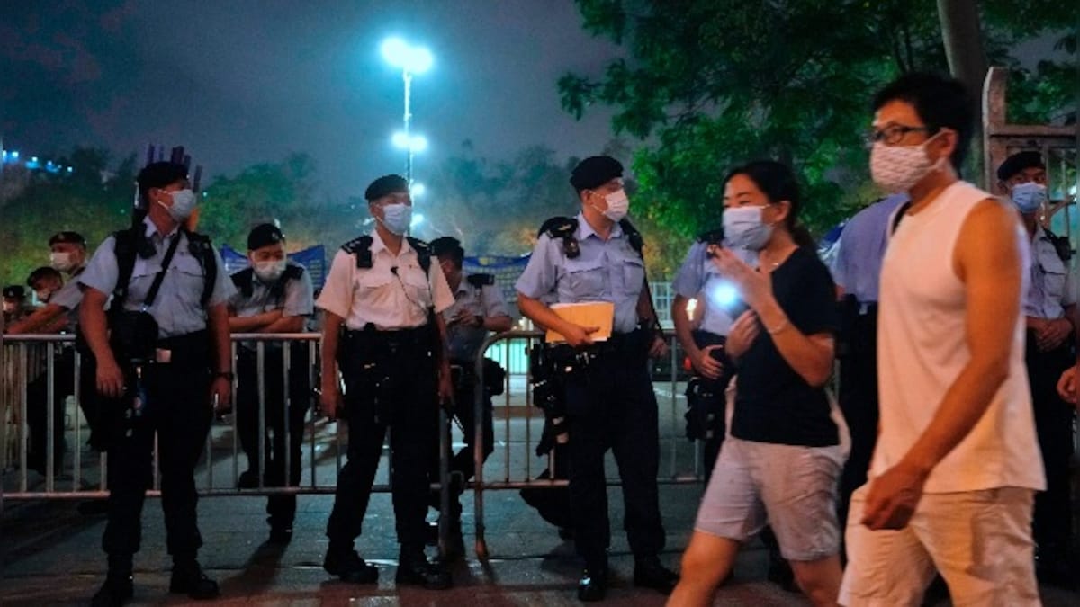 Tiananmen massacre: Hundreds gather around Hong Kong park to remember victims despite constraints