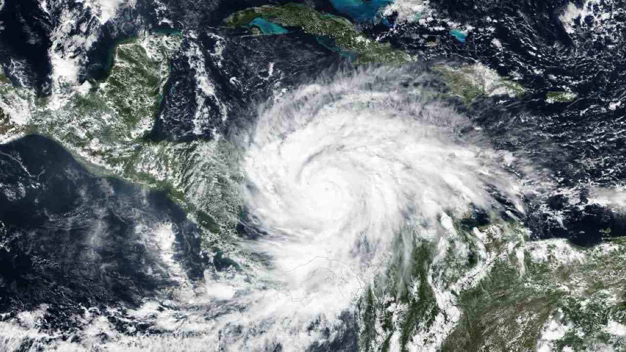 To prepare for a hurricane, it is important to have a family and business disaster plan, maintaining a hurricane survival kit and adding metal hurricane shutters or hurricane-resistant windows can help. Image credit: NASA