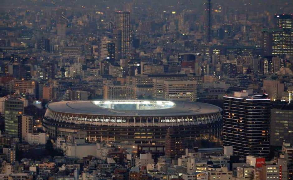 HOLD FOR SHUJI - Japan National Stadium, where opening ceremony and many other events are planned for postponed Tokyo 2020 Olympics, is seen from a rooftop observation deck Thursday, Jan. 21, 2021, in Tokyo. (AP Photo/Kiichiro Sato)