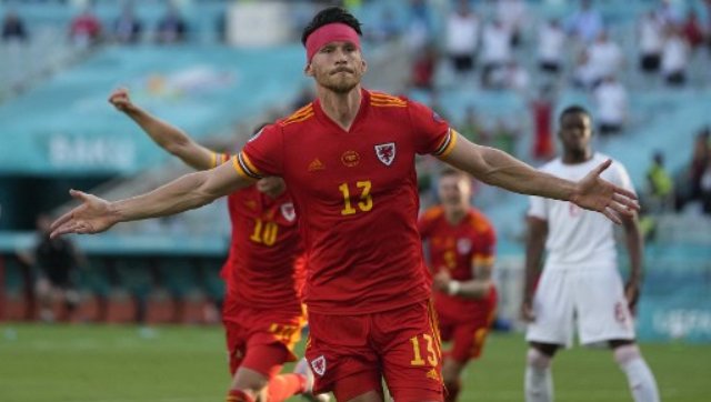 Euro 2020: Kieffer Moore's towering header sees Wales grab point with 1-1 draw against Switzerland Euro 2020: Kieffer Moore's towering header sees Wales grab point with 1-1 draw against Switzerland