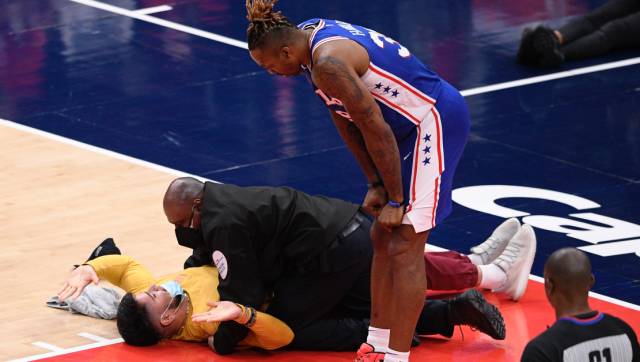 NBA: Unruly spectator runs out on court during 76ers-Wizards playoff game NBA: Unruly spectator runs out on court during 76ers-Wizards playoff game