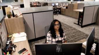 As people return to offices, companies rethink workspace layouts with wider hallways, fewer desks