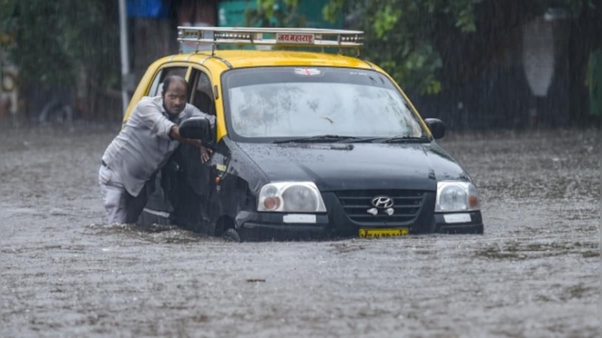 Mumbai rains: IMD issues red alert as monsoon arrives early; roads waterlogged, local trains disrupted