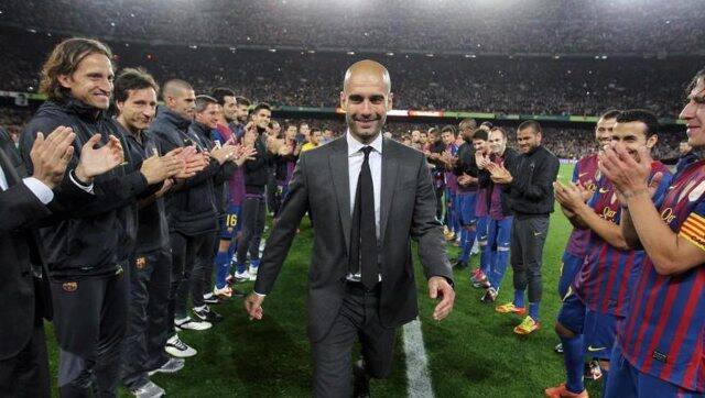 File image of then Barcelona manager Pep Guardiola being greeted by the players. Image credit: LaLiga media 