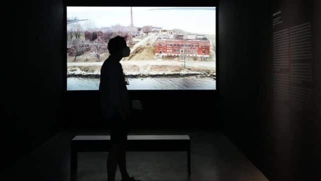 Laura Poitras' exhibition created in collaboration with Sean Vegezzi is currently on display at the NKB gallery in Berlin. Image via The Associated Press/ Markus Schreiber