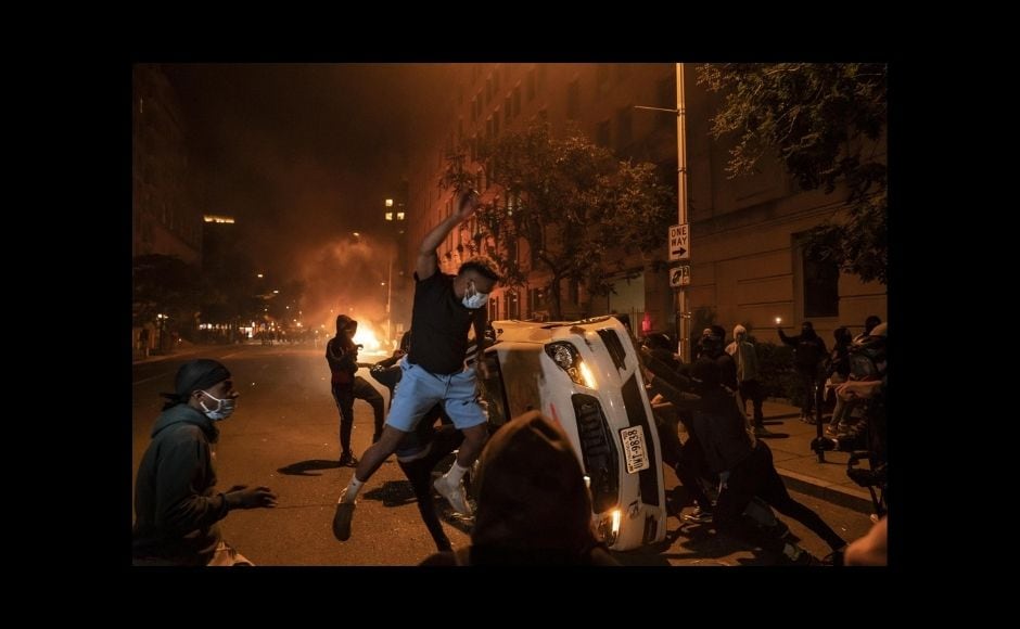 “It means the world to me to share this with my colleagues,” Minchillo said on Twitter. “I hoped for one Pulitzer in a lifetime of hustling and this is how I wanted it. With my people, on the big story.” | In the picture: Demonstrators vandalise a car as they protest the death of George Floyd, 31 May, 2020, near the White House in Washington, DC Floyd died after being restrained by Minneapolis police officers. The image was part of a series of photographs by The Associated Press that won the 2021 Pulitzer Prize for breaking news photography. Photo via The Associated Press/Evan Vucci “It means the world to me to share this with my colleagues,” Minchillo said on Twitter. “I hoped for one Pulitzer in a lifetime of hustling and this is how I wanted it. With my people, on the big story.” | In the picture: Demonstrators vandalise a car as they protest the death of George Floyd, 31 May, 2020, near the White House in Washington, DC Floyd died after being restrained by Minneapolis police officers. The image was part of a series of photographs by The Associated Press that won the 2021 Pulitzer Prize for breaking news photography. Photo via The Associated Press/Evan Vucci