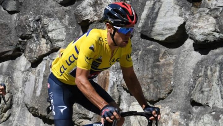 Ineos' Australian cyclist Richie Porte fends off Alexey Lutsenko to win Criterium du Dauphine