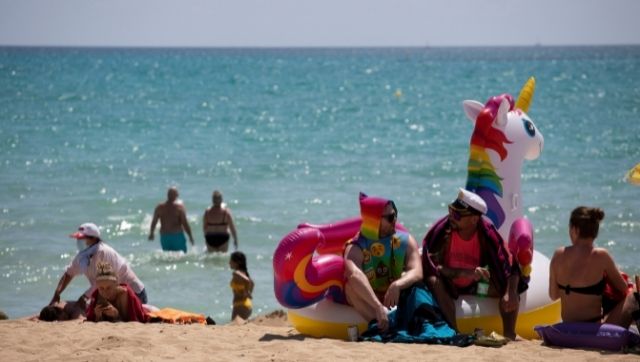 UK man ignores warnings not to park on beach and finds van floating in sea UK man ignores warnings not to park on beach and finds van floating in sea