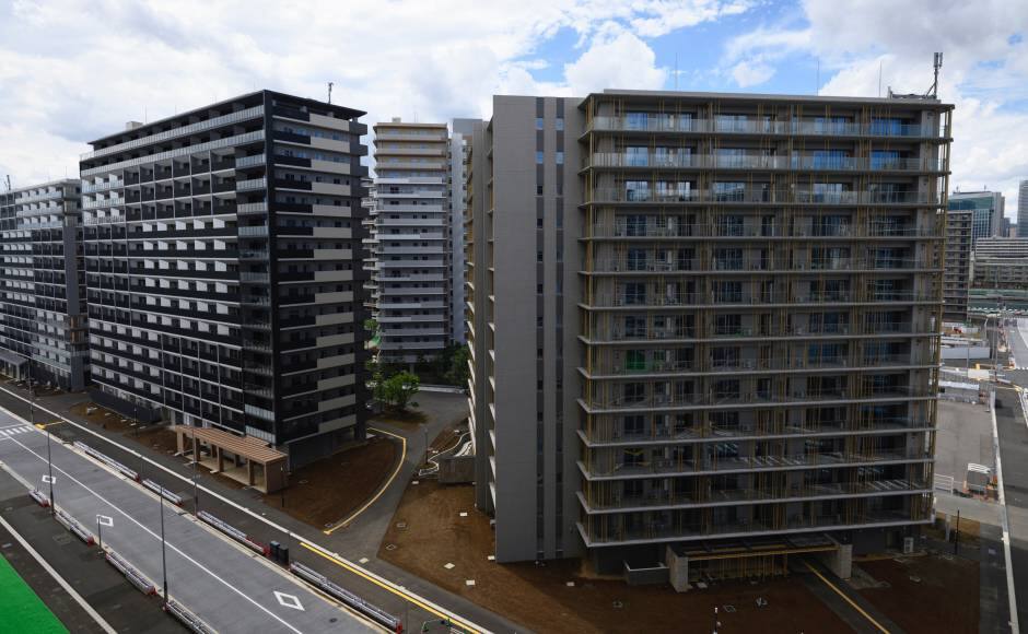 Residential buildings for athletes during a media tour at the Olympic and Paralympic Village for the Tokyo 2020 Games, constructed in the Harumi waterfront district of Tokyo, Japan, on Sunday, June 20, 2021. Photographer: Akio Kon/Bloomberg