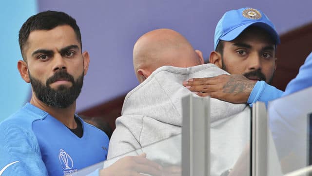 India skipper Virat Kohli and opener KL Rahul wear a forlorn look after the team’s defeat to New Zealand in the semi-final. AP