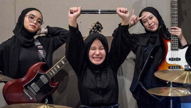 Indonesia's hijab-wearing heavy metal band on pursuing their passion, finding 'courage' through music Indonesia's hijab-wearing heavy metal band on pursuing their passion, finding 'courage' through music