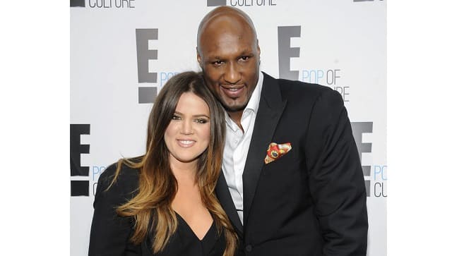 In this April 30, 2012, file photo, Khloe Kardashian Odom and Lamar Odom from the show Keeping Up With The Kardashians attend an E! Network upfront event at Gotham Hall in New York. (AP Photo/Evan Agostini, File)