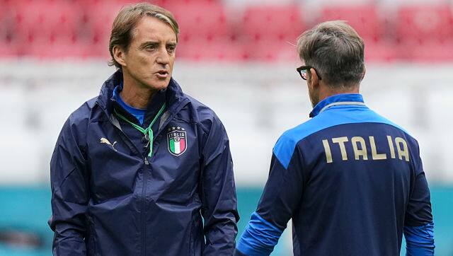Italy&rsquo;s manager Roberto Mancini talks to Alberico Evani during a training session ahead of Friday&rsquo;s Euro 2020 QF clash against Belgium. AP